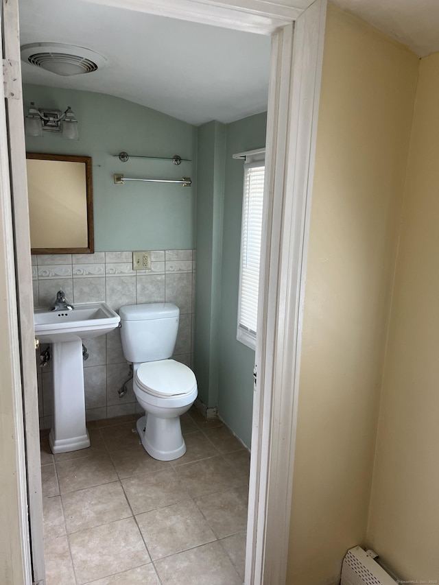 40 Bellevue Rd, New Haven, CT 06511 - half bath featuring toilet, tile walls, and tile patterned flooring