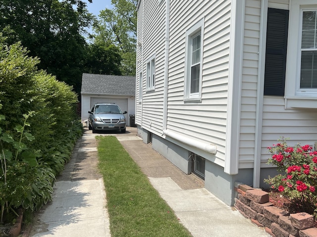 40 Bellevue Rd, New Haven, CT 06511 - view of side of property featuring an outdoor structure and a detached garage