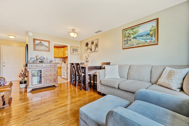 421 Tolland St Unit 312, East Hartford, CT 06108 - living area with light wood-style floors