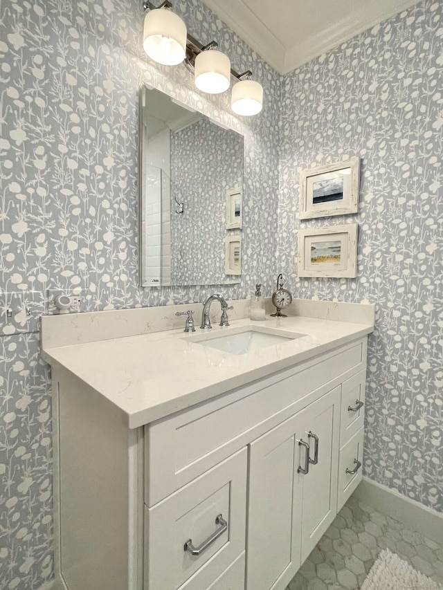 506 Jamestown Rd Unit 506, Stratford, CT 06614 - bathroom with wallpapered walls, ornamental molding, vanity, and baseboards