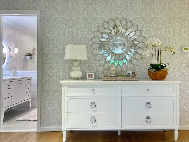 506 Jamestown Rd Unit 506, Stratford, CT 06614 - detailed view of wallpapered walls, wood finished floors, baseboards, and crown molding