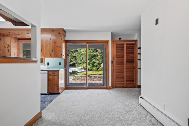 10 Wyndwood Rd, West Hartford, CT 06107 - kitchen with a baseboard heating unit, carpet flooring, and white dishwasher