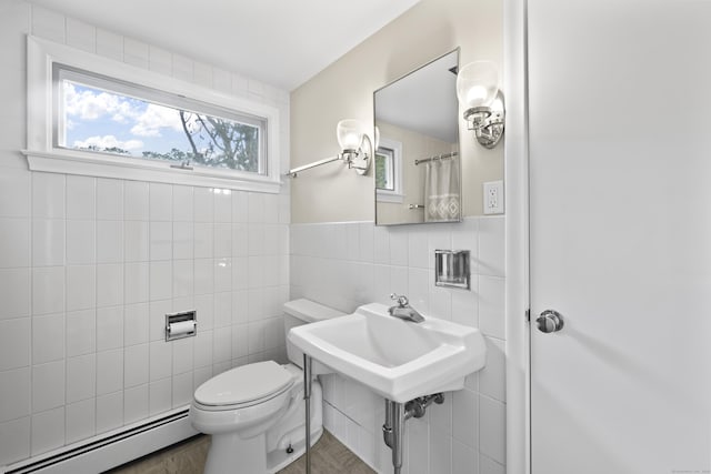 10 Wyndwood Rd, West Hartford, CT 06107 - full bathroom with a baseboard radiator and tile walls