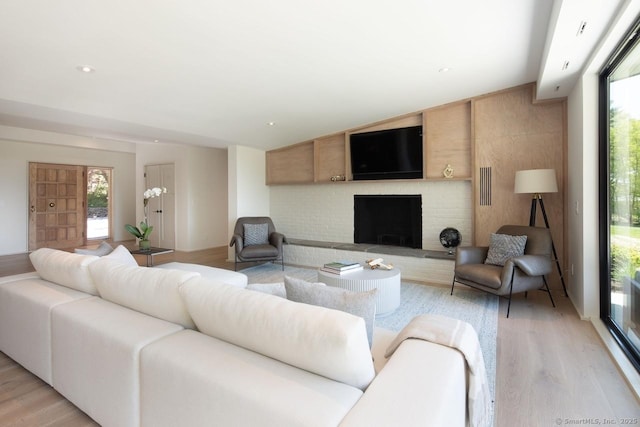 136 Belgo Rd, Salisbury, CT 06039 - living room with light wood-style flooring and a fireplace