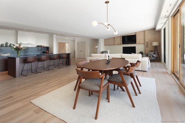 136 Belgo Rd, Salisbury, CT 06039 - dining space featuring light wood-style floors and a chandelier