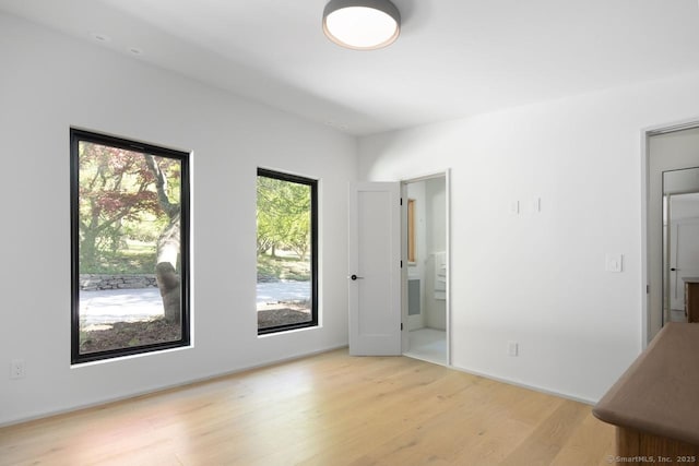 136 Belgo Rd, Salisbury, CT 06039 - unfurnished bedroom with light wood finished floors and ensuite bath