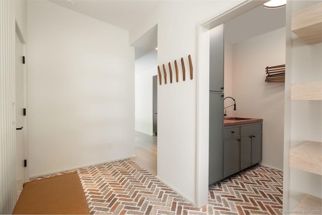 136 Belgo Rd, Salisbury, CT 06039 - corridor featuring brick flooring and a sink