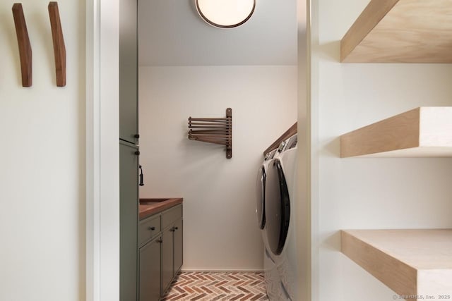 136 Belgo Rd, Salisbury, CT 06039 - laundry room with separate washer and dryer, brick patterned floors, and cabinet space