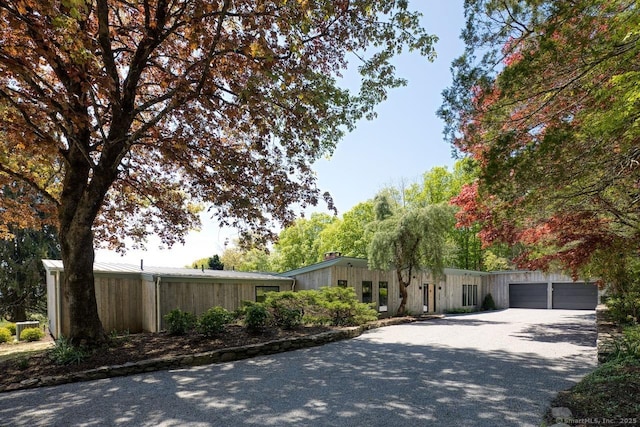 136 Belgo Rd, Salisbury, CT 06039 - mid-century home with driveway and a garage