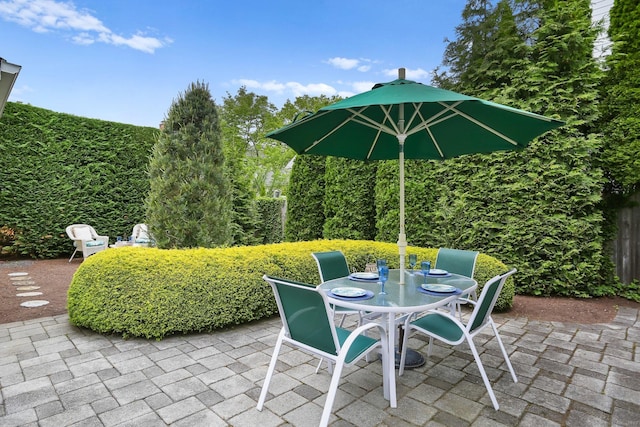 102 Pratt St, Fairfield, CT 06824 - view of patio featuring outdoor dining area