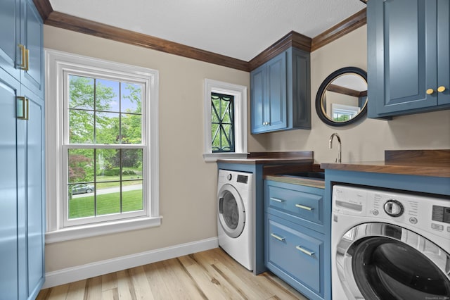 18 Ferry Rd, Old Lyme, CT 06371 - laundry room with washer / dryer, crown molding, cabinet space, plenty of natural light, and a textured ceiling