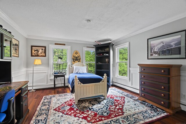 18 Ferry Rd, Old Lyme, CT 06371 - bedroom featuring a baseboard radiator, a textured ceiling, multiple windows, crown molding, and a wainscoted wall