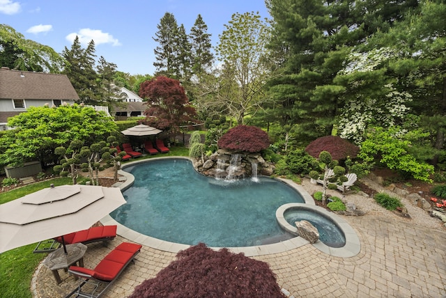18 Ferry Rd, Old Lyme, CT 06371 - view of pool featuring a pool with connected hot tub and a patio