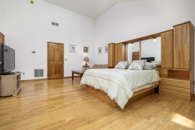 17 Walker Ln, Weston, CT 06883 - bedroom featuring high vaulted ceiling, light wood-type flooring, and baseboards