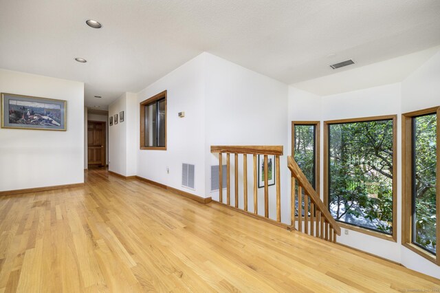 17 Walker Ln, Weston, CT 06883 - spare room with wood finished floors, baseboards, and recessed lighting