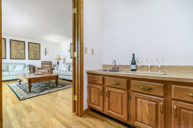 17 Walker Ln, Weston, CT 06883 - indoor wet bar featuring light wood-type flooring