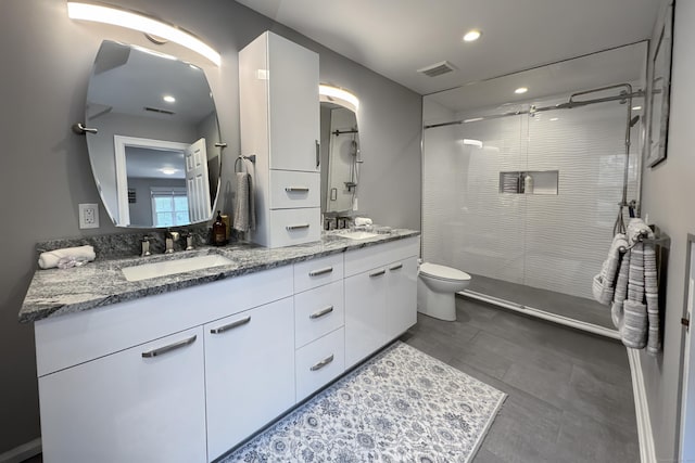 368 Nod Hill Rd, Wilton, CT 06897 - bathroom featuring double vanity, a shower with shower door, toilet, and recessed lighting