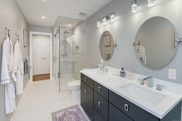 368 Nod Hill Rd, Wilton, CT 06897 - full bathroom featuring a shower stall, double vanity, toilet, and recessed lighting