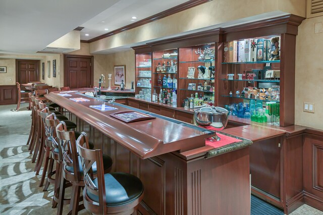 368 Nod Hill Rd, Wilton, CT 06897 - indoor wet bar with ornamental molding and carpet floors