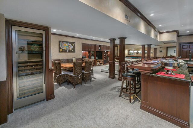 368 Nod Hill Rd, Wilton, CT 06897 - indoor bar with ornamental molding, ornate columns, light carpet, and recessed lighting
