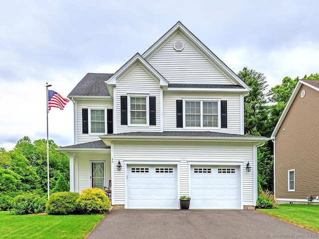 40 Great Plain Dr Unit 40, Plainville, CT 06062 - traditional home featuring asphalt driveway, an attached garage, and a front lawn