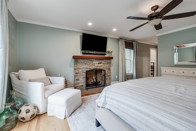 15A Shore Rd, Waterford, CT 06385 - bedroom with wood finished floors, crown molding, a fireplace, recessed lighting, and a ceiling fan