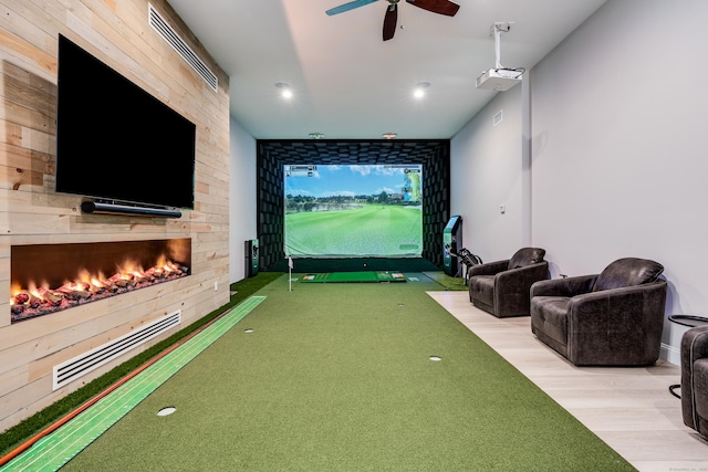 15A Shore Rd, Waterford, CT 06385 - recreation room featuring an area to practice putting, a ceiling fan, wooden walls, light carpet, and recessed lighting