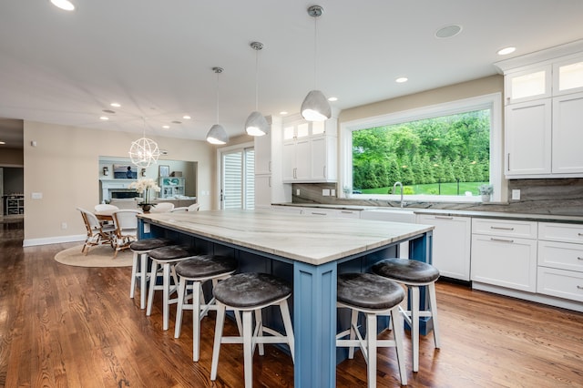 15A Shore Rd, Waterford, CT 06385 - kitchen with white cabinets, plenty of natural light, and recessed lighting