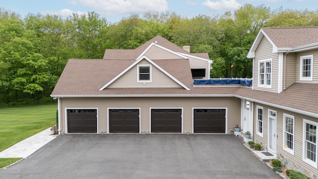 15A Shore Rd, Waterford, CT 06385 - garage with asphalt driveway