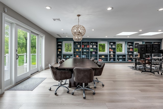 15A Shore Rd, Waterford, CT 06385 - office area with recessed lighting, wood finished floors, a skylight, and a chandelier