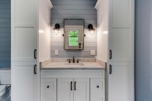 15A Shore Rd, Waterford, CT 06385 - bathroom featuring vanity and wooden walls