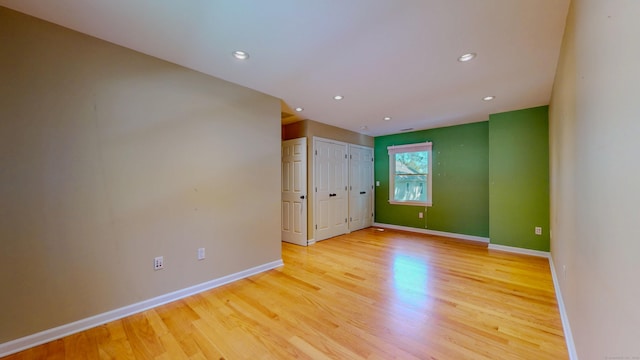 23 Bartlett Mnr, Norwalk, CT 06850 - spare room featuring light wood-type flooring, baseboards, and recessed lighting