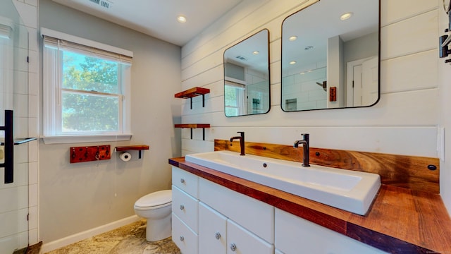 23 Bartlett Mnr, Norwalk, CT 06850 - full bath with toilet, vanity, baseboards, and recessed lighting