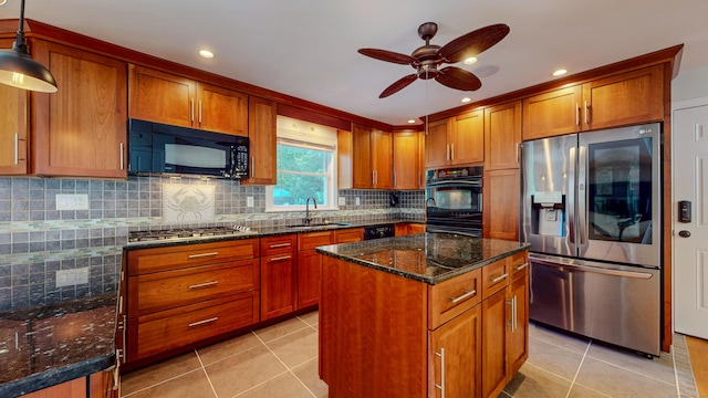 23 Bartlett Mnr, Norwalk, CT 06850 - kitchen with black appliances, a sink, light tile patterned floors, brown cabinetry, and ceiling fan