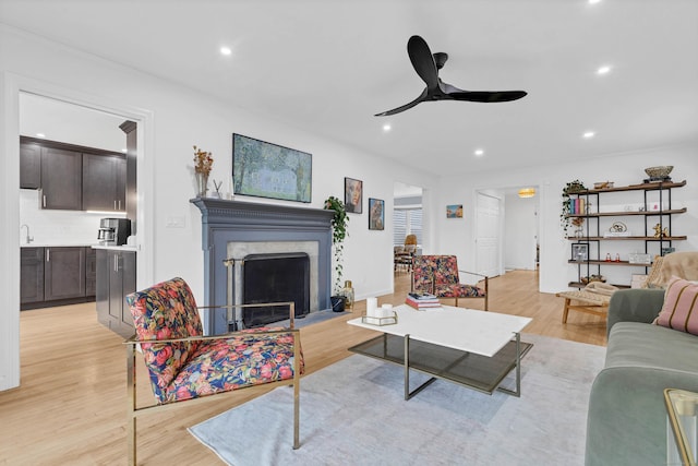 2 Quanaduck Cove Ct Unit 2, Stonington, CT 06378 - living room with recessed lighting, ceiling fan, light wood finished floors, and a fireplace