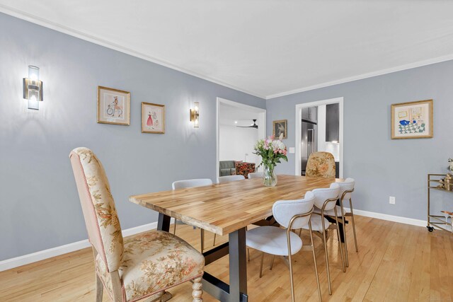 2 Quanaduck Cove Ct Unit 2, Stonington, CT 06378 - dining space featuring light wood-style flooring, ornamental molding, and baseboards