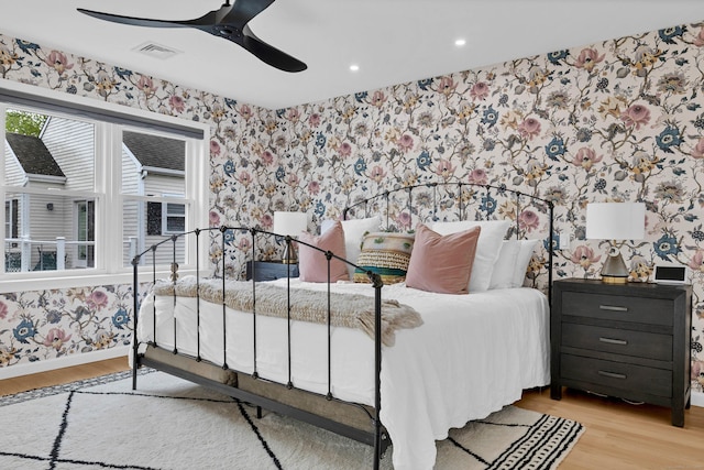 2 Quanaduck Cove Ct Unit 2, Stonington, CT 06378 - bedroom with wallpapered walls, wood finished floors, baseboards, a ceiling fan, and recessed lighting