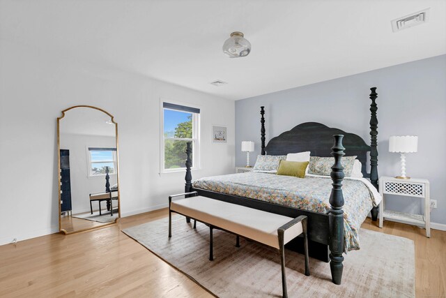 2 Quanaduck Cove Ct Unit 2, Stonington, CT 06378 - bedroom with light wood-type flooring and baseboards