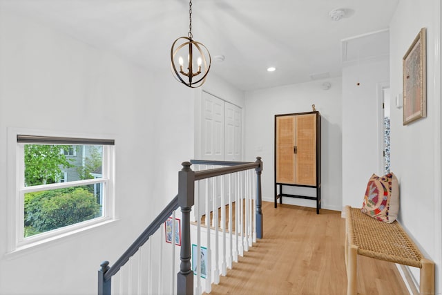 2 Quanaduck Cove Ct Unit 2, Stonington, CT 06378 - hallway with attic access, an upstairs landing, light wood finished floors, recessed lighting, and a chandelier
