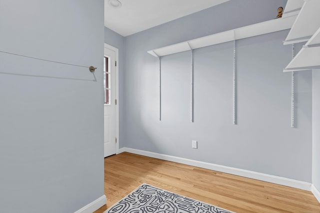 2 Quanaduck Cove Ct Unit 2, Stonington, CT 06378 - unfurnished room featuring baseboards and light wood-type flooring