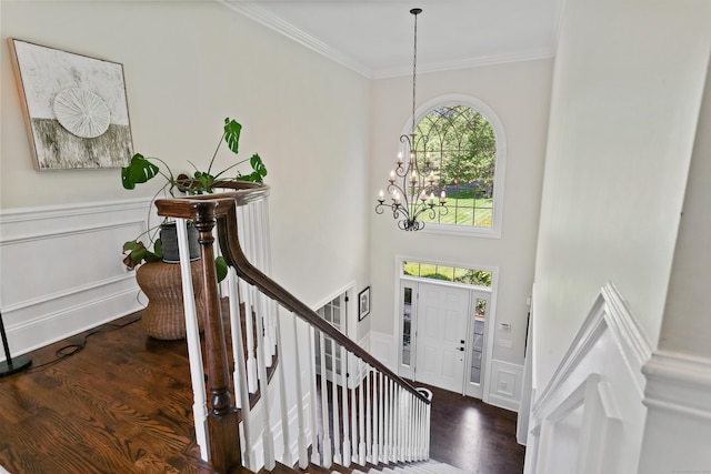 10 Easton Heights Ln, Easton, CT 06612 - foyer entrance featuring ornamental molding, a chandelier, wood finished floors, stairs, and wainscoting