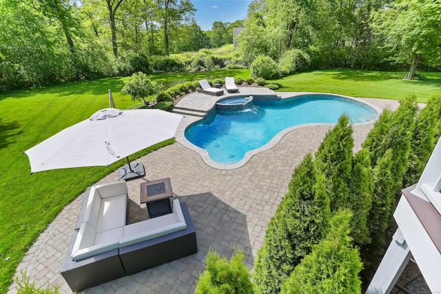 10 Easton Heights Ln, Easton, CT 06612 - view of pool with a patio area, a yard, view of scattered trees, and a pool with connected hot tub