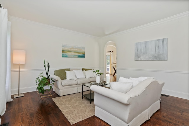 10 Easton Heights Ln, Easton, CT 06612 - living area with ornamental molding, arched walkways, wood finished floors, and baseboards