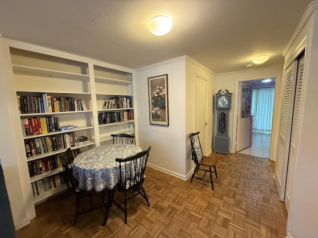 11 Gibbs St Apt 9, Winchester, CT 06098 - dining space with baseboards, ornamental molding, and built in features