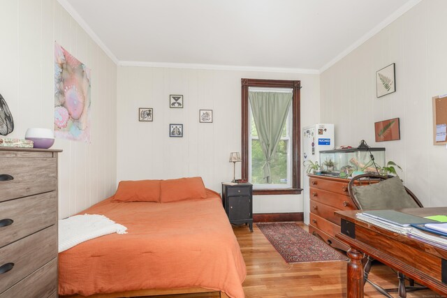 76 Edwards St, New Haven, CT 06511 - bedroom with ornamental molding and wood finished floors