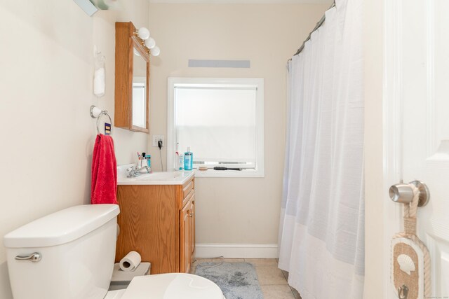 76 Edwards St, New Haven, CT 06511 - bathroom featuring toilet, tile patterned floors, vanity, and a shower with curtain