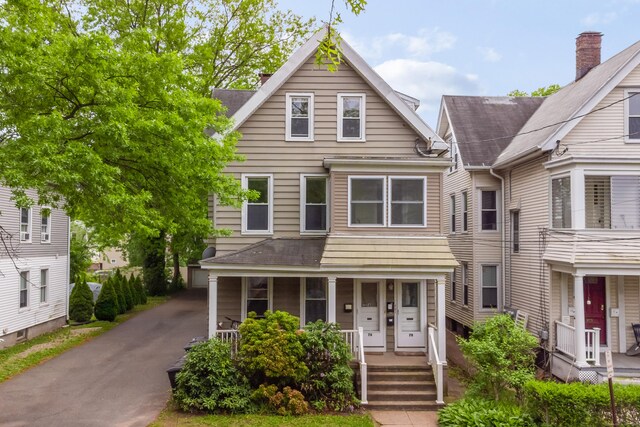 76 Edwards St, New Haven, CT 06511 - view of front of home with a porch and roof with shingles