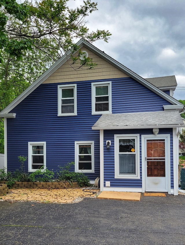 909 N Colony Rd, Meriden, CT 06450 - view of front facade featuring a shingled roof