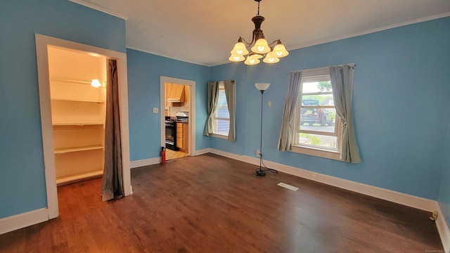 909 N Colony Rd, Meriden, CT 06450 - unfurnished dining area with a chandelier, ornamental molding, dark wood finished floors, and baseboards