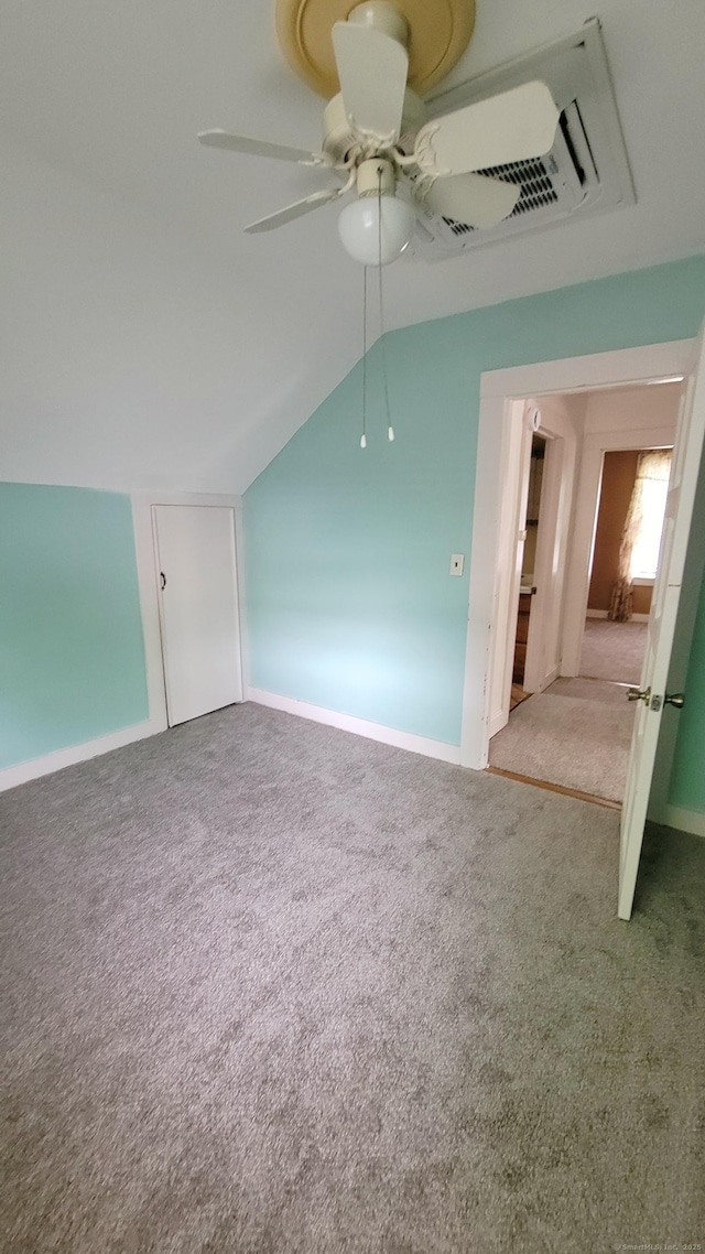 909 N Colony Rd, Meriden, CT 06450 - empty room with carpet, a ceiling fan, vaulted ceiling, and baseboards